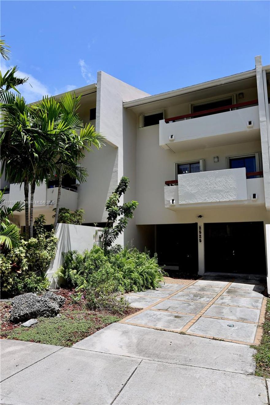 Welcome to your serene retreat in the heart of North Miami. This charming 2-bedroom, 2.5-bath home offers 1,566 sq. ft. of well-designed living space on a quiet, tree-lined street just steps from Oleta River State Park. Enjoy your mornings on the covered front porch overlooking peaceful natural surroundings, or unwind in the spacious living and dining areas filled with natural light. The home features a one-car garage with ample storage, ideal for outdoor gear or hobby space. Both bedrooms offer en-suite baths for comfort and privacy. With nature at your doorstep and city conveniences nearby, this home blends tranquility with everyday ease.