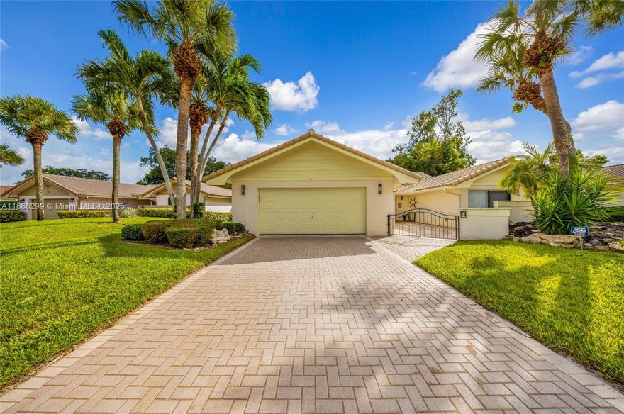 Own a beautifully designed home in one of Boca Raton’s top communities. A gated front courtyard leads to  double doors, opening into a spacious layout with high ceilings and a glass-enclosed patio. The renovated kitchen features granite counters, a large island & new appliances. Neutral tile flooring, updated bathrooms & 2 car garage w/newer washer & dryer add to the home’s appeal. The layout is perfect for entertaining. A rare opportunity for buyers seeking luxury, privacy and prime location. Walk across the circle to a community pool. Basic cable w/2 HBO channels & lawn care incld. No renting. Roof about 6 yrs old, a/c 4 yrs old. Listing is subject to errors, changes, & omissions without notice, information in this listing is not warranted or guaranteed & must be confirmed by buyer.