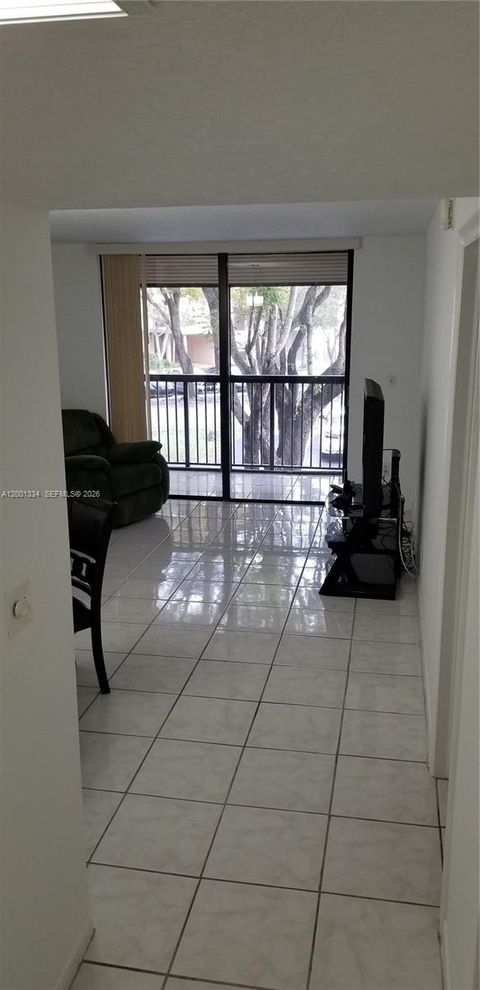 Photo of 14201 N Kendall Dr #212-D, Miami, FL 33186 (MLS # A12001334)