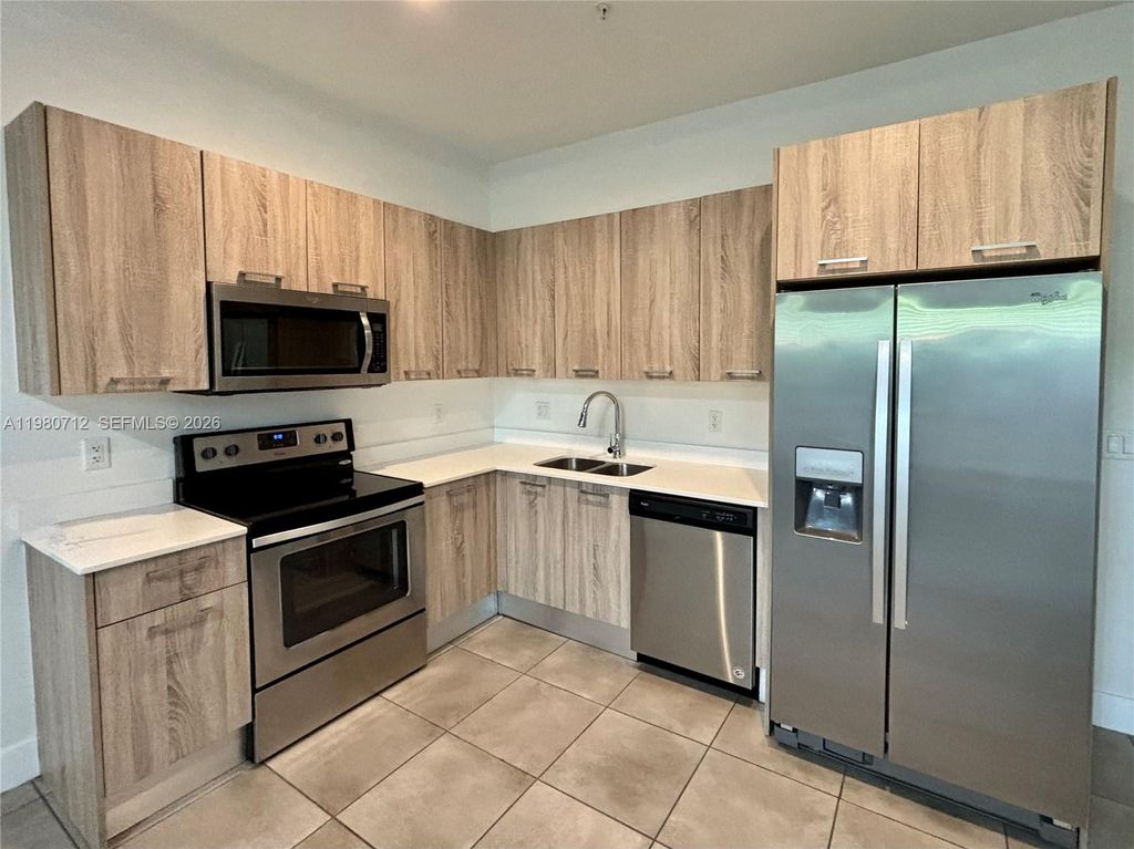 Photo of 440 NE 35th Ct #2, Oakland Park, FL 33334 (MLS # A11980712)