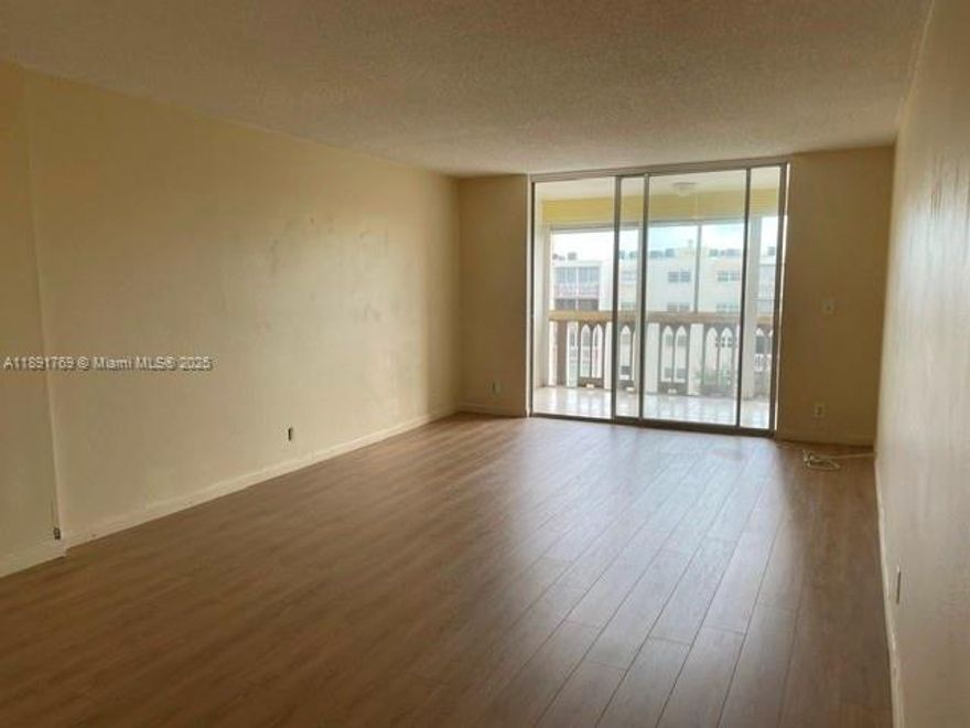 Discover comfortable and affordable living in this peaceful 55+ community in the heart of Hallandale Beach! This spacious 1-bedroom, 1.5-bath condo offers a bright open layout, screened balcony, and plenty of natural light. The unit is clean and well-maintained, with classic finishes—ready for your personal touch. Enjoy a friendly, quiet atmosphere with community amenities such as a pool, clubhouse, and shuffleboard. Conveniently located near shopping, dining, medical offices, and just minutes to the beach. One occupant must be 55 or older.