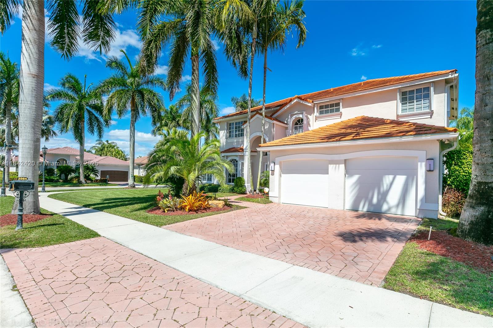 This luxury home is ideal for top executives seeking style, comfort, and functionality. Completely remodeled with high-end finishes and outstanding craftsmanship, it features 5 bedrooms plus a spacious office that can serve as a 6th bedroom. Includes a private guest suite downstairs with full bath. The chef’s kitchen boasts quartz countertops, while marble floors flow through the main living areas and laminate flooring upstairs. Spa-like baths with Italian cabinetry and custom walk-in closets. Enjoy cool evenings on the covered patio or take a dip in the sparkling pool. Hurricane shutters, impact French doors, modern shades, and drapes ensure safety and sophistication. A must-see executive retreat!