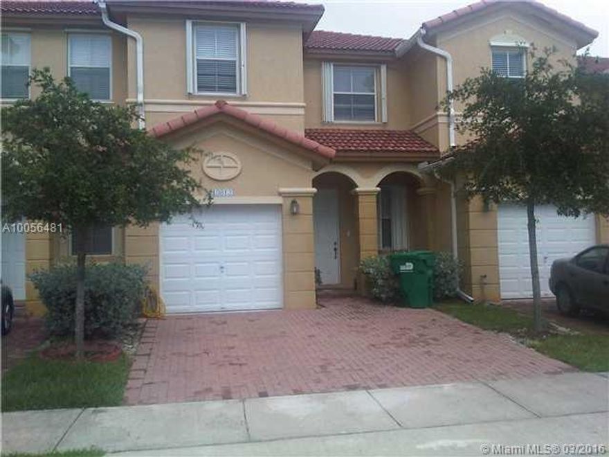 Gated community with access control. 3 bedrooms, 2 bathrooms and 1/2, NEW woods floors, kitchen upgraded with new stainless steel appliances, granite tops. Glass showers doors. tiled patio, community club house, private pool and many amenities. Just block from the new 74th exit and access to the Florida turnpike