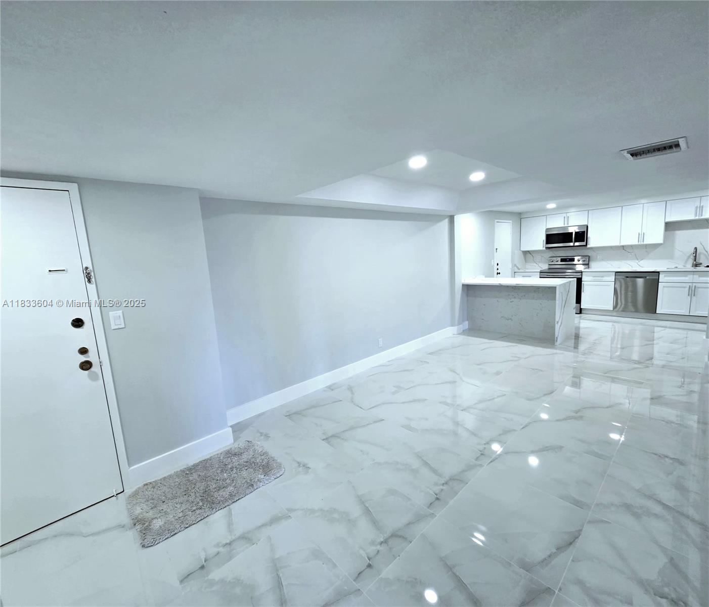 Located in a private community, this beautifully remodeled property is a rare opportunity! . 3 Bedrooms 3 Full Bathrooms. Featuring brand-new floors, a new A/C unit, a new water heater, and a fully upgraded kitchen with new appliances, cabinets, and countertops. The community offers top-tier amenities, including two racquetball courts, an indoor golf simulator, a playroom, a meeting room, a library, a gym, and more. Move-in ready and designed to impress! Just 5 minutes from Florida’s Turnpike and Commercial Blvd. Don't miss out—schedule your showing today!