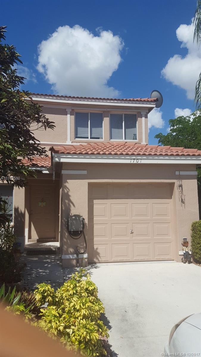 Fabulous 4 bed, 2.5 bath home, located in quiet Harmony Lakes, vaulted ceilings on the water! Light and bright! Upgraded kitchen with stainless steel appliances and granite breakfast bar overlooking spacious family room with water views! Large master suite with updated bathroom. Screened patio perfect for entertaining. Rich espresso flooring in all bedrooms with ample closets. Has hurricane protection. Community pool and playground. Superior schools. Sorry , no pets at this time. 1st, last and security required with clean credit and good income.
