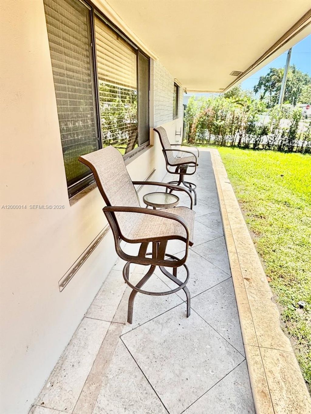 Photo of 8771 NW 15th Ct, Pembroke Pines, FL 33024 (MLS # A12000014)