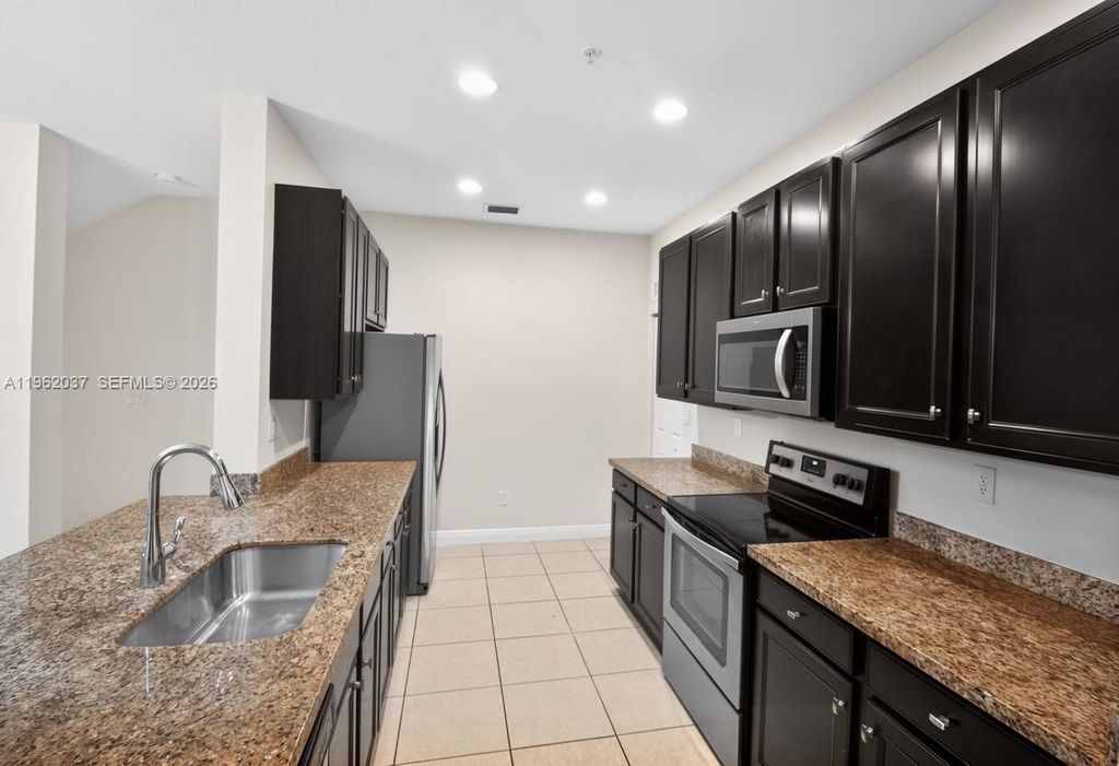 Photo of 1032 SW 147th Ave #10101, Pembroke Pines, FL 33027 (MLS # A11962037)