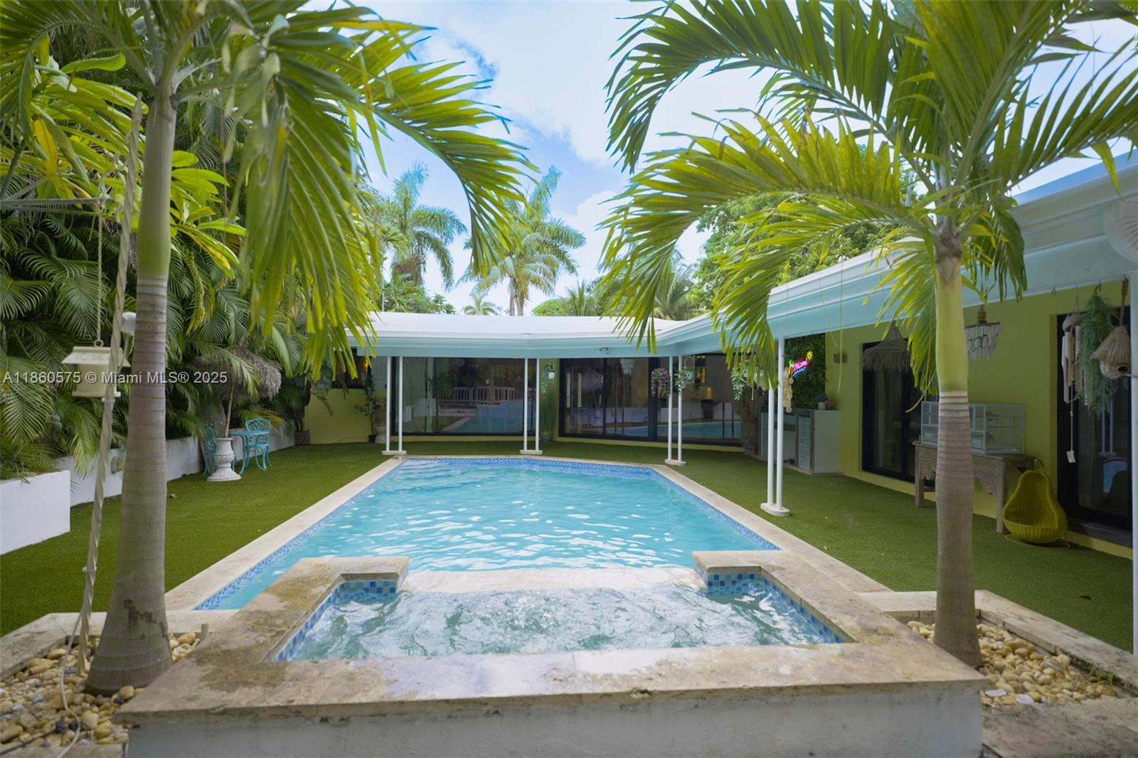 Experience refined Miami living in this elegantly upgraded residence. A new roof, AC, impact windows, generator, water heater, and pool heater provide peace of mind, while the professionally designed landscaping and maintenance-free turf create a resort-like setting. The sparkling pool and lush outdoor areas are ideal for both relaxation and entertaining. Inside, an office space offers flexibility and can easily serve as an extra bedroom. The property also features a brand-new septic tank, adding further value and convenience. Perfectly situated near fine dining, shopping, and major highways, this home offers a rare combination of luxury, comfort, and convenience.