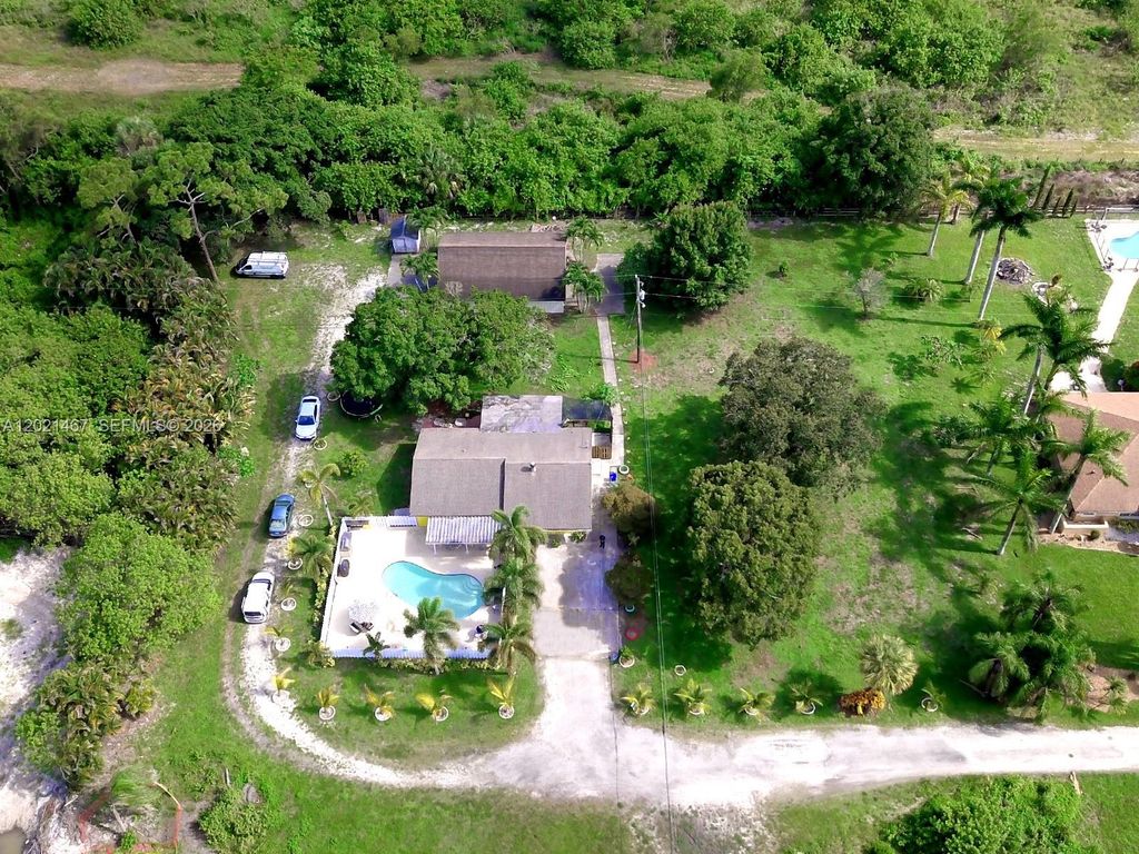 Photo of 10646 Barn Rd, Lake Worth, FL 33449 (MLS # A12021467)