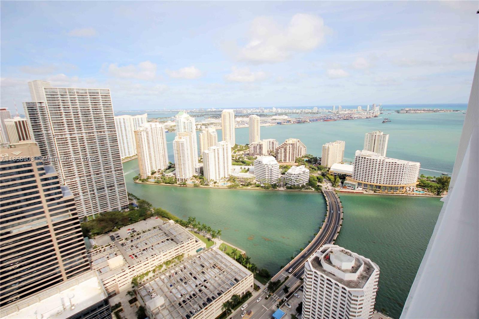 THE TOWERING VIEWS FROM THIS SPACIOUS 1 BEDROOM ON THE 52nd FLOOR ARE EVERYTHING. LIVE THERE LIKE YOU OWN THE WORLD. LARGE BALCONY. WHITE TILE EVERYWHERE. OPEN KITCHEN WITH ITALIAN CABINETRY. HIGH CEILINGS WITH 10 FEET. BREATHE LARGE AND LIVE LARGE. 1 ASSIGNED PARKING. CABLE TV & INTERNET INCLUDED. DISHWASHER. WASHER/DRYER. CENTRALLY LOCATED IN A LUXURY TOWER WITH ALL AMENITIES. 24/7 FRONTDESK, SECURITY & VALET PARKING. 2 HEATED INFINITY POOLS. JACUZZI. VERY NICE GYM OPEN 24/7. BUSINESS CENTER. CHILDREN PLAYROOM. ON-SITE CONVENIENCE STORE. QUICK ACCESS TO BRICKELL CITY CENTER & MARY BRICKELL VILLAGE.