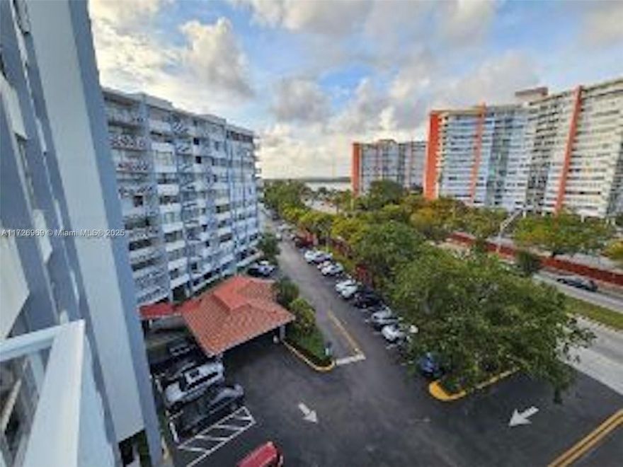 Wonderful top-floor unit in a secure building with a pool and elevators. This unit comes with one deeded garage spot and one spot right out the back door of the lobby. The current owner rents the garage spot on a monthly basis for added income. The unit has tile floors throughout and LVP in the master bedroom. The bathrooms are nicely updated. Unit is in the corner of the building and offers the largest balcony in the building and offers southern views to downtown Miami. This is also the largest square footage floor plan in the building. This unit is above the trees and does not face Miami Gardens Drive. There are no current assessments, and this HOA has required reserves and passed the 40 and 50-year inspections.