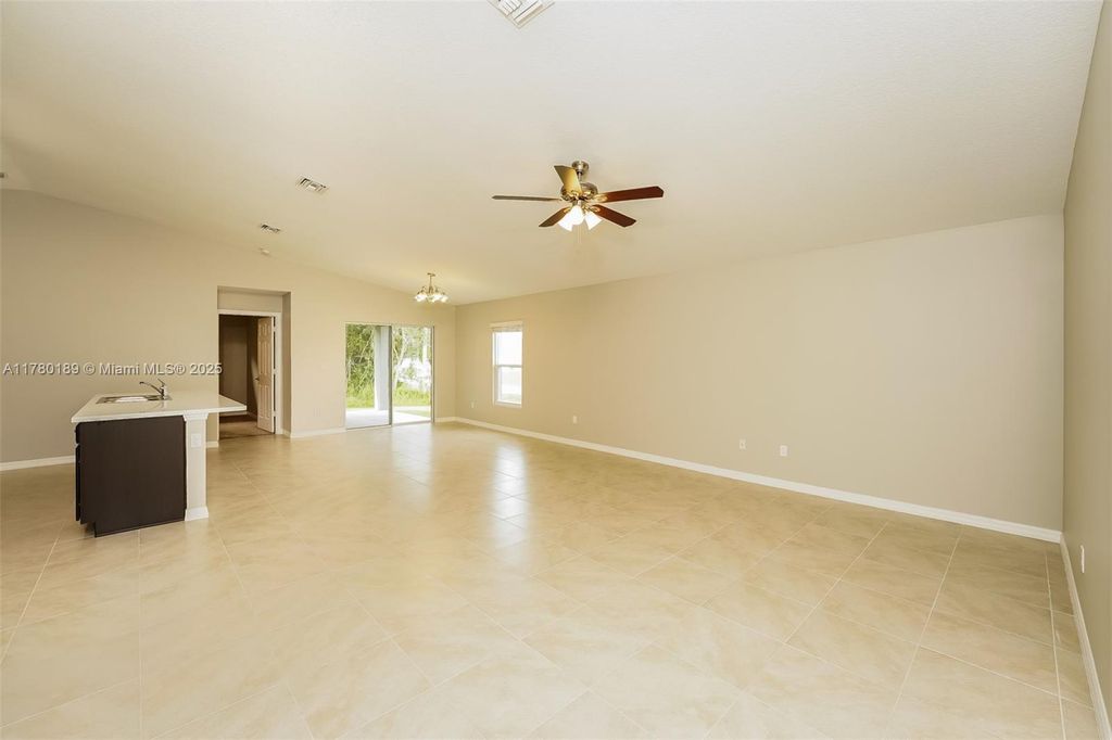 Photo of 2450 SW Madiera St, Port Saint Lucie, FL 34953 (MLS # A11780189)