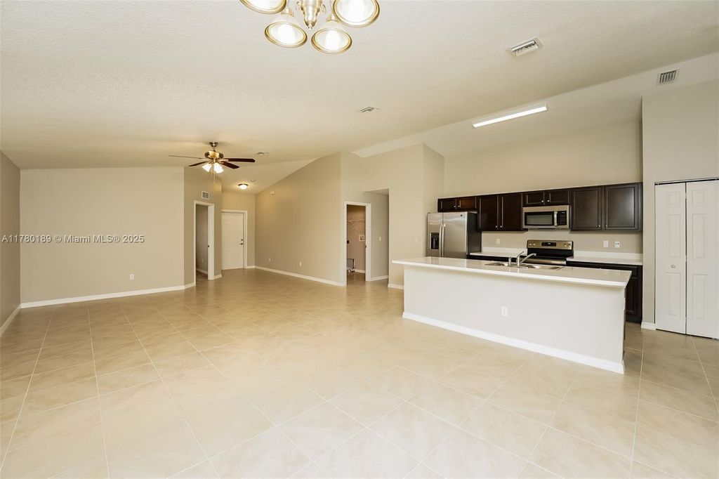 Photo of 2450 SW Madiera St, Port Saint Lucie, FL 34953 (MLS # A11780189)