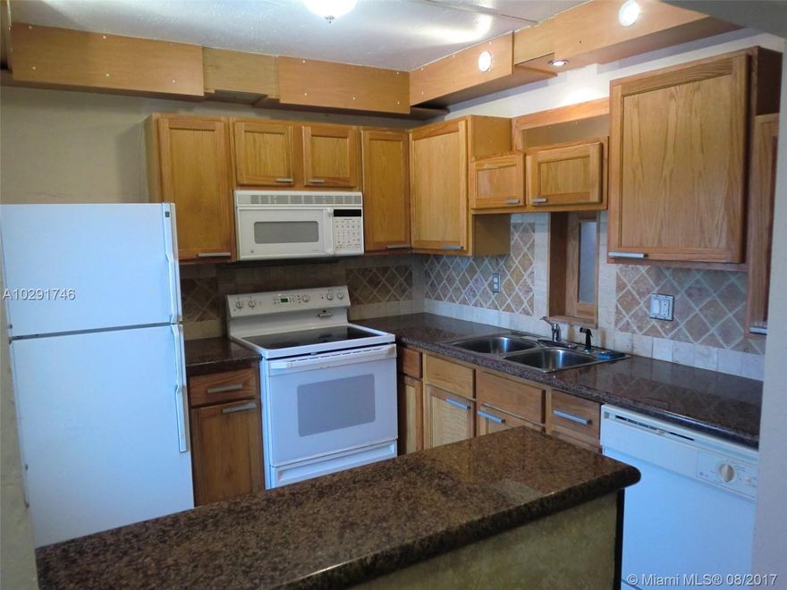 Completely renovated, stone travertine floor. Very quiet and secured neighborhood. 5 minutes to the beach.