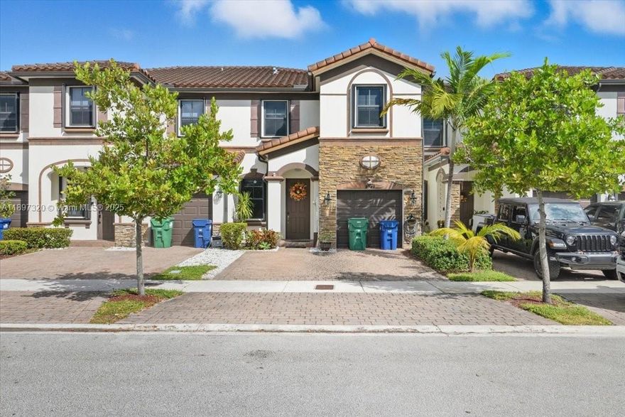 Beautiful 5-bedroom, 2.5 bath townhome in Miami Lakes featuring a serene lake view from the private back patio. The garage has been converted into an additional bedroom or office, offering flexible living space on the first floor. Inside, you’ll find custom wallpaper designs and unique light fixtures that add modern character and style. Enjoy comfortable living in a peaceful community close to parks, shops, and top-rated schools.
