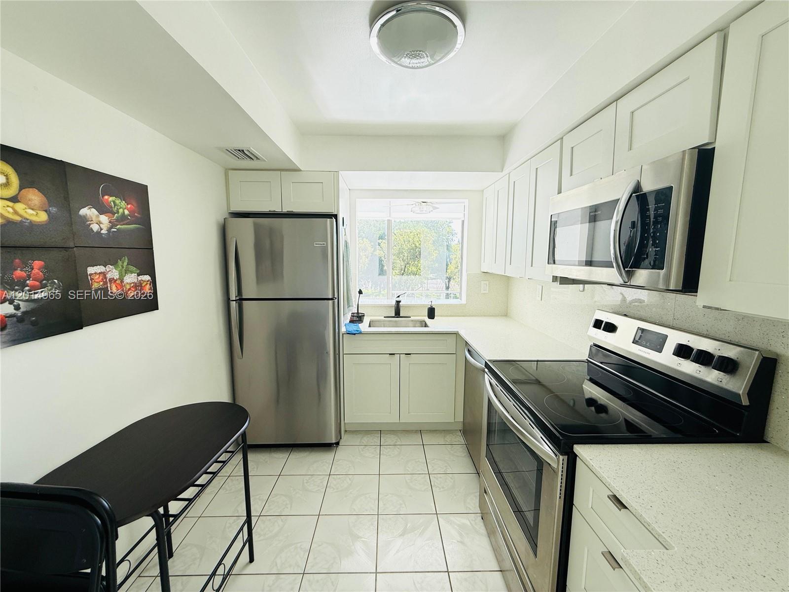 VERSIALLES GARDENS II CON - Residential Lease