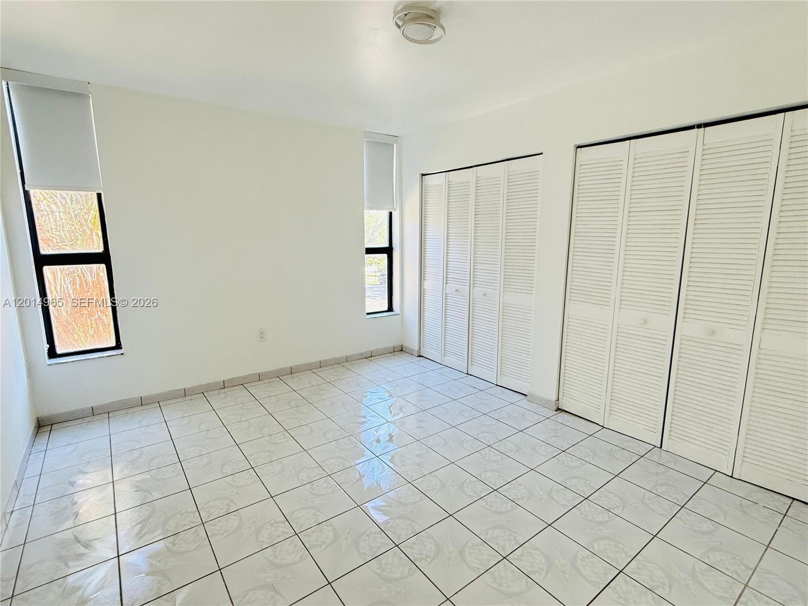 VERSIALLES GARDENS II CON - Residential Lease