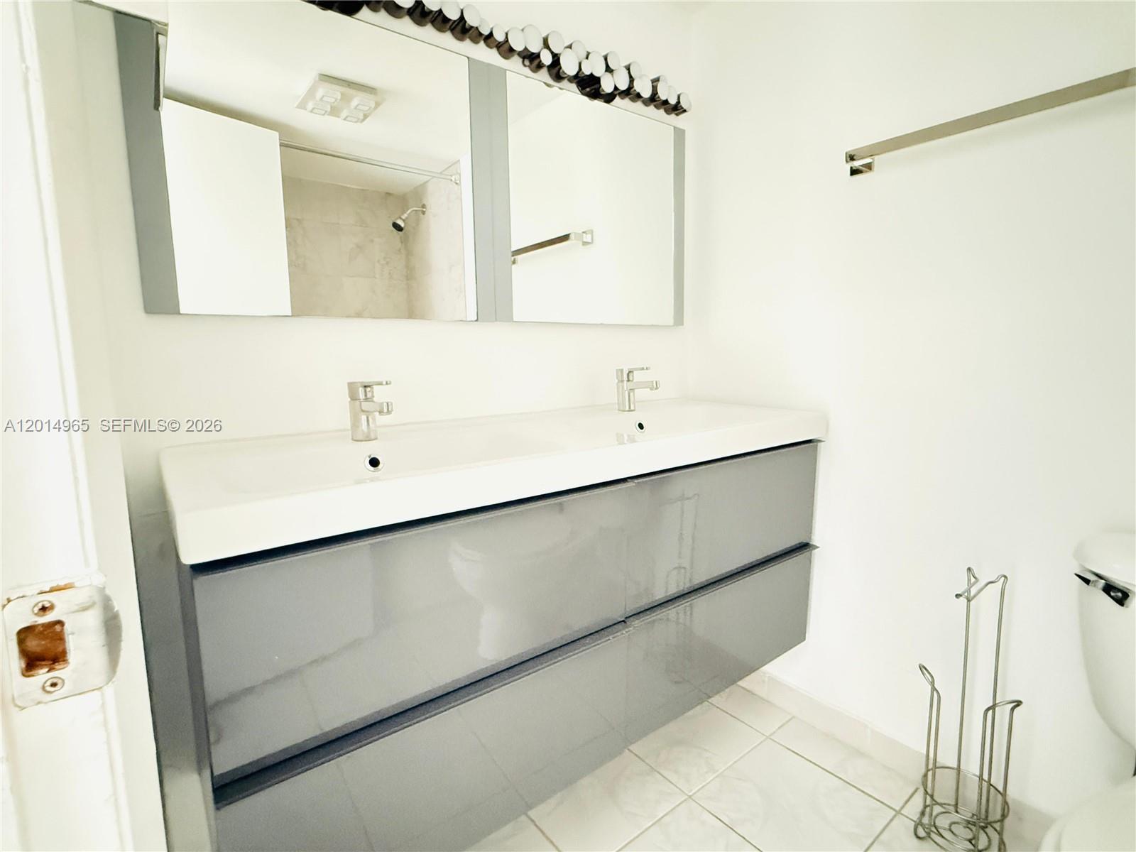 VERSIALLES GARDENS II CON - Residential Lease
