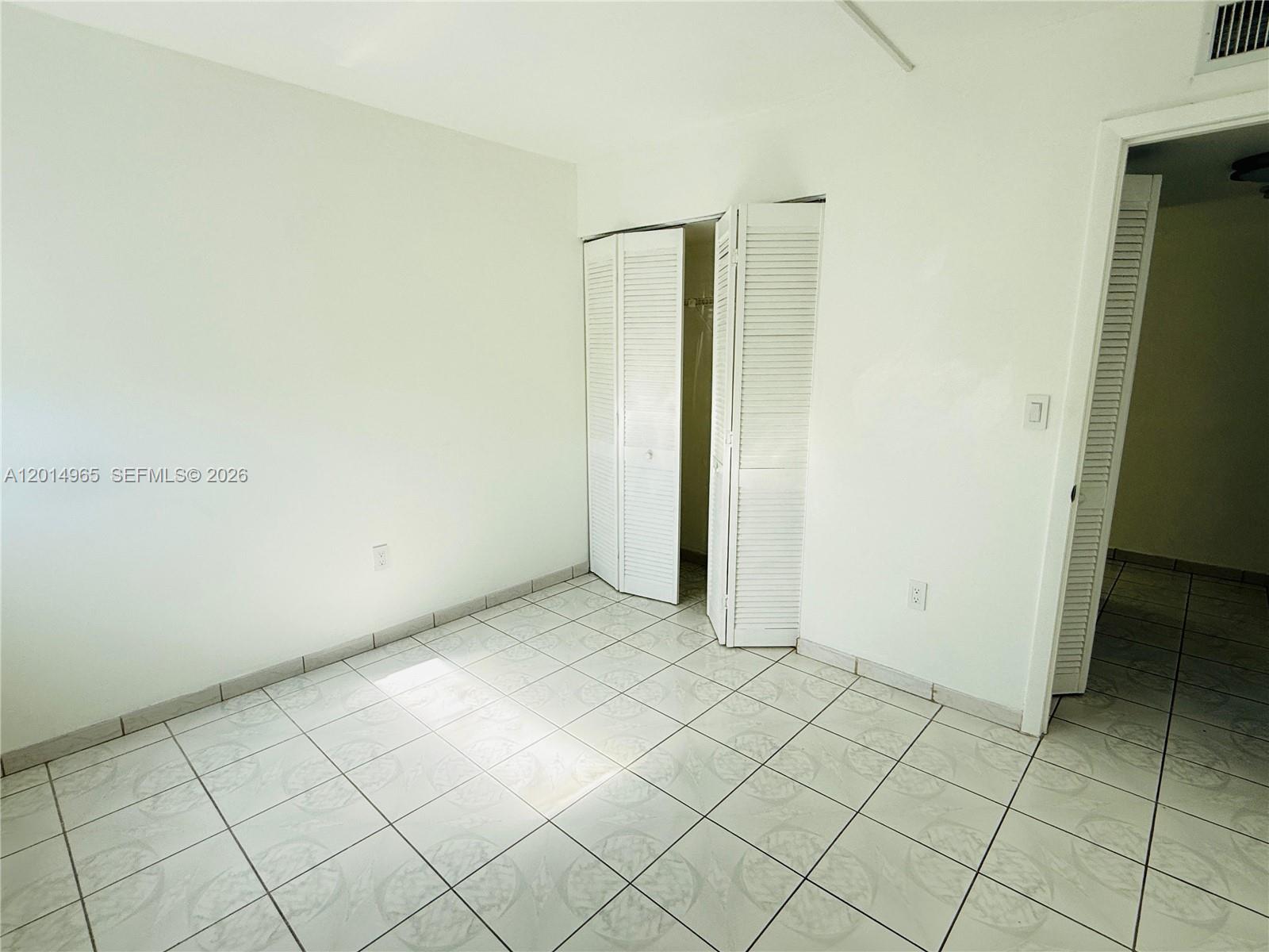 VERSIALLES GARDENS II CON - Residential Lease