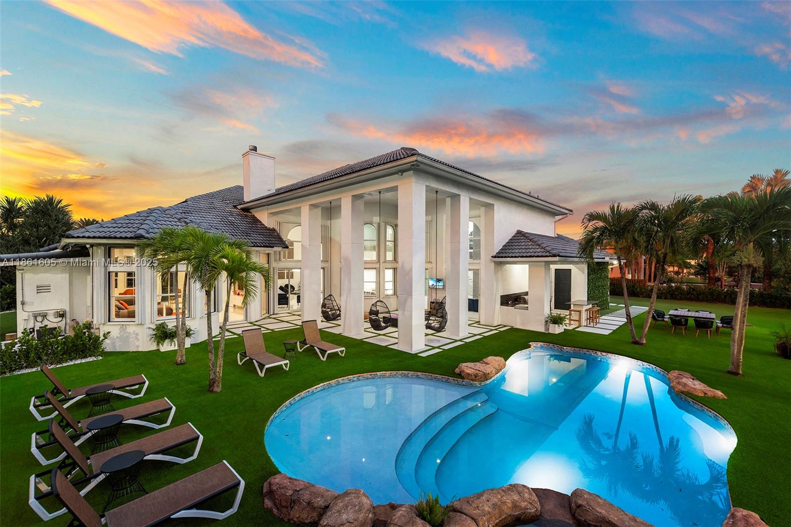 Step into unparalleled luxury renovated home boasting 7BD/4.5BA in Davie estate. Equipped with a 3-car garage on nearly an acre of resort-style grounds. The expansive backyard is an entertainer’s dream, showcasing a basketball court, soccer field, batting cage, miniature golf course, sparkling pool and spa, and a full outdoor kitchen. Inside, indulge in a state-of-the-art movie theater, a gourmet chef’s kitchen, and elegant living spaces designed for both comfort and style. The first-floor primary suite is a private sanctuary, offering a spa-inspired bath with dual-entry shower and soaking tub and oversided closet. This extraordinary home blends elegance, recreation, and sophistication in one of Davie’s most sought-after locations.