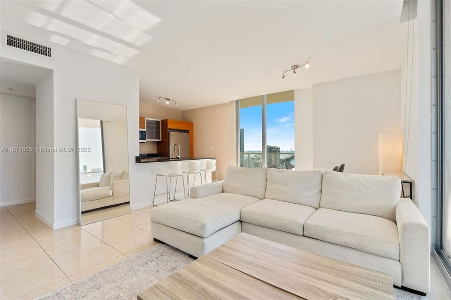 Modern 2BR/3BA condo at 2 Midtown Miami featuring floor-to-ceiling windows, abundant natural light, and sweeping city views. Spacious open layout with sleek kitchen, premium appliances, and stylish bathrooms. Resort-style building amenities include pool, fitness center, sauna, hot tub, and concierge. Unbeatable location steps from Target, Marshalls, Ross, dining, and nightlife, with easy access to Wynwood, Design District, Downtown, and Miami Beach. A perfect opportunity to own in one of Miami’s most vibrant lifestyle hubs.