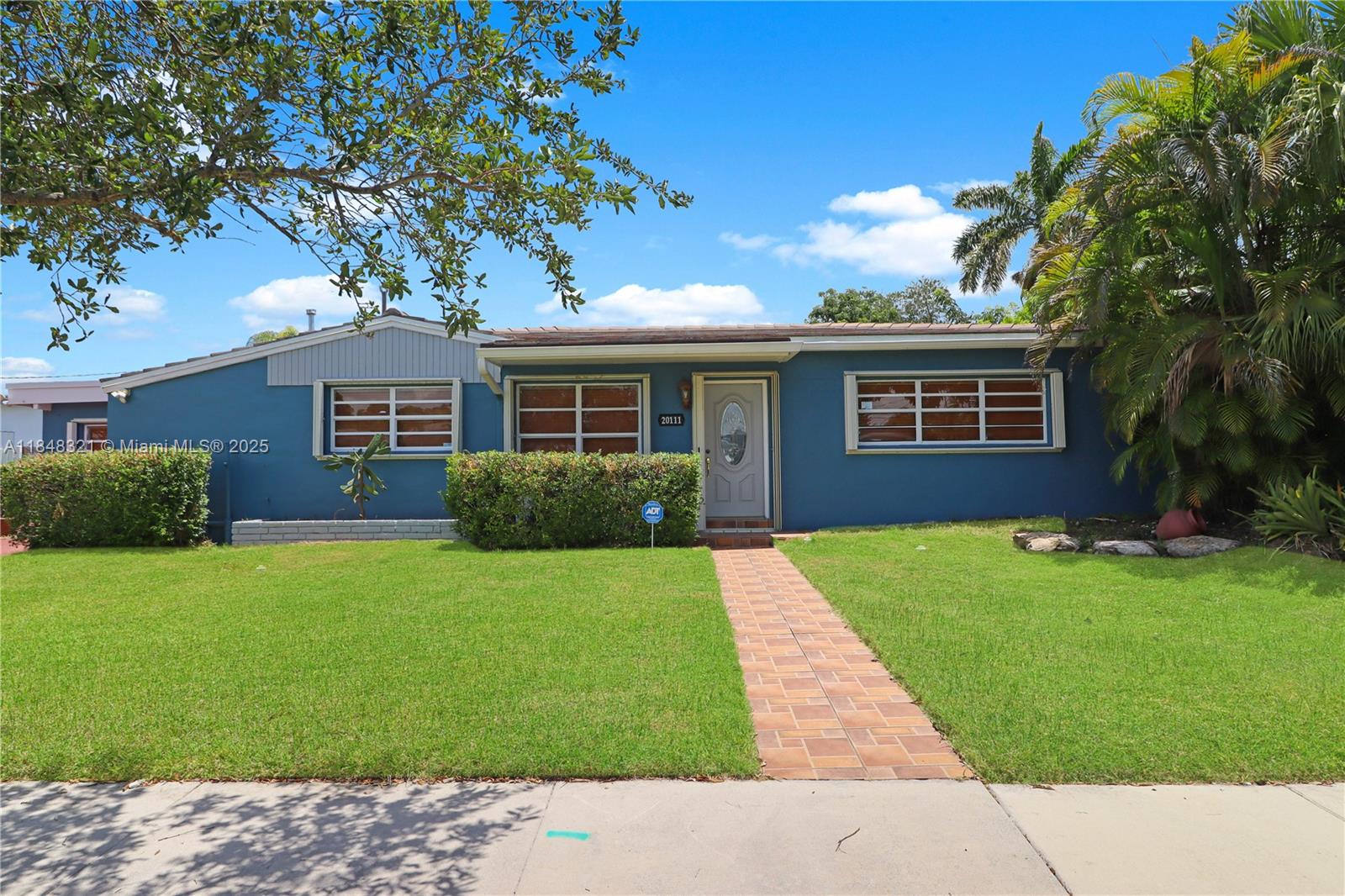 Don't miss out on this spacious home in Cutler Bay, offering modern comfort and an open layout. The main house features 3 bedrooms and 2 bathrooms. Step inside to discover new, contemporary flooring that flows seamlessly throughout the entire house. The kitchen features stainless steel appliances and ample cabinet space for all your culinary needs. Enjoy the convenience and style of one fully modern, renovated bathroom, alongside a second well-appointed bathroom. Beyond the primary residence, a large, detached efficiency unit located out back offers incredible flexibility, featuring its own 1 bedroom and 1 bathroom, as well as a kitchen area. This is perfect for extended family or guests.