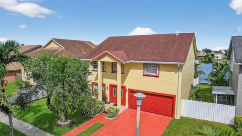 Photo of 1001 SW 100th Ter, Pembroke Pines, FL 33025 (MLS # A11885922)