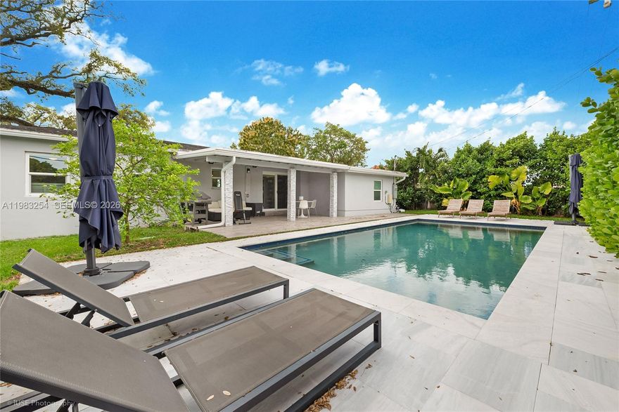 Welcome to this beautifully fully renovated residence, where modern elegance meets comfort and functionality. Thoughtfully redesigned with high-end finishes throughout, this home offers a bright and open floor plan that cretas an inviting and airy atmosphere from the moment you step inside.

The entrante and kitchen both showcase lovely views of the garden and pool, bringing natural beauty and light into the heart of the home.  The kitchen and bathrooms are appointed with luxurious marble countertops, combining timeless style with everyday practicality. The primary bathroom also features a Roman bathtub, perfect for relaxing in a spa-like setting after a long day.

Step outside to enjoy your private backyard oasis featuring a heated saltwater pool, perfect for relaxing or entertaining all near-round.  The property is Enhanced by mature fruit trees, adding charm and a touch of nature as well as a conveniente storage shed for additional space.

Additional upgrades invade impactada windows for safety and energy efficiency, along with a roof that is less than five years old, offering peace of mind for years to come.

For those seeing a move-in ready opportunity, the home can be offered fully furnished at the right Price, making it ideal as a primar residence, seasonal retreat, or Investment property.

This exceptional home truly combines style, Comfort, and conveniente in a beautiful setting.