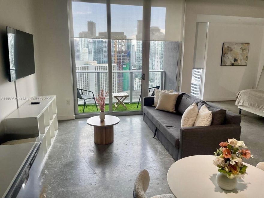 LOFT STYLE CONDO WITH 10 FEET HIGH CEILINGS. One bedroom open plan, Great city and bay views. Washer and Dryer in unit. Recreation Area with Health Club & Spa, Rooftop Pool, Residents Lounge & Social Room, Skyline Lounge, and E-Lounge. Basic cable and Internet included. 24-hour reception desk, 24-hour valet parking available. Parking not included; Tenants can get a parking space at Miami Tower or Valet paying a monthly fee. VACANT AND MOVE-IN READY