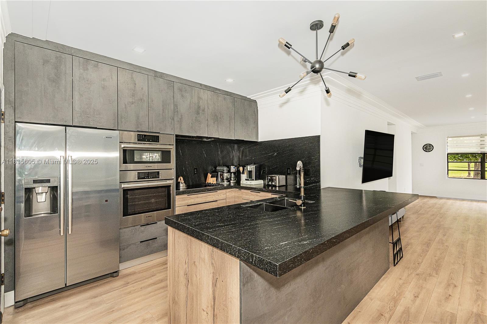 This beautifully updated contemporary home is located on the prestigious Normandy Island, offering direct views of the Normandy Shores Golf Club. Situated within a quiet, gated community, the residence features 3 spacious bedrooms, 3 bathrooms, and a covered garage. The backyard is ideal for entertaining, with a covered dining terrace and a BBQ area
Enjoy exclusive community amenities, brand-new tennis courts, outdoor gym, playground, and 24/7 guard-gated security. Just minutes away, Normandy Isle Park offers a pool, basketball and volleyball courts. Conveniently located with easy access to the beach, top-rated schools, and major highways.
