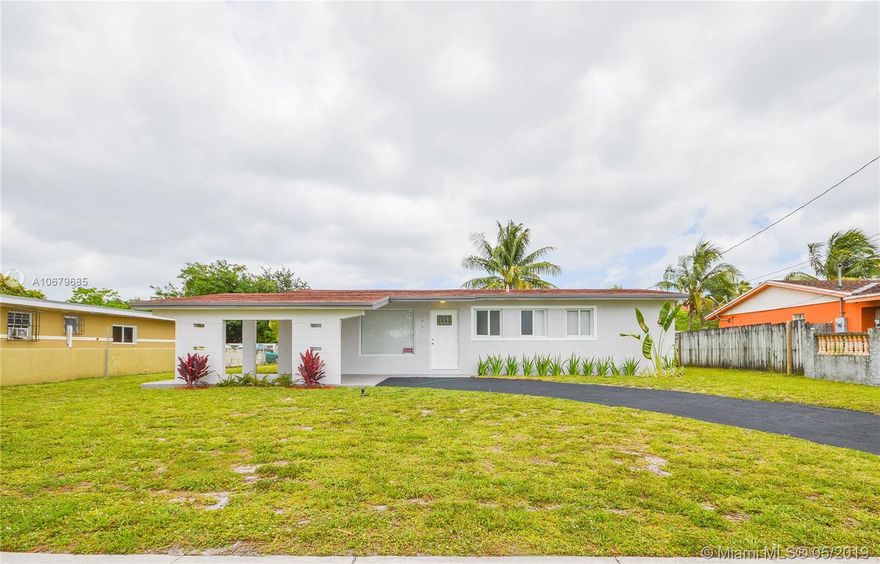 Beautifully updated canal front 3 bedroom 2 bath with a den, single family home.  Updates include custom kitchen with quartz countertops, new stainless steel appliances, updated windows, new laminated wood flooring throughout with new baseboards, updated baths, new interior/exterior doors, new window blinds,  repainted interior/exterior, tankless water heater, new light fixtures, new landscaping.  Wont last!