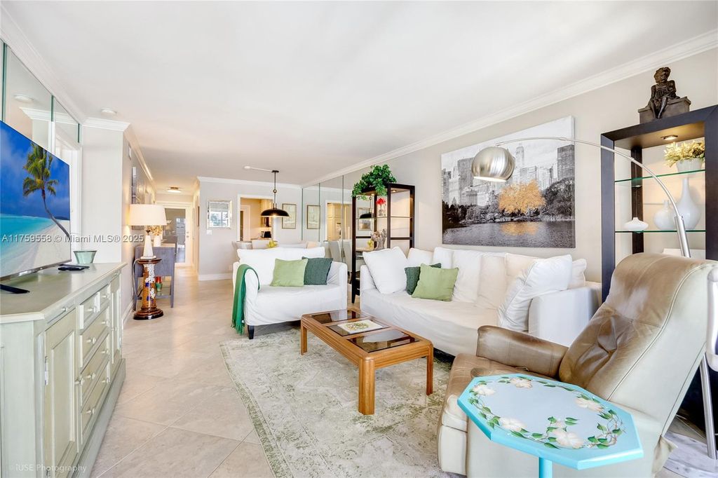 Photo of 300 Golden Isles Dr #302, Hallandale Beach, FL 33009 (MLS # A11759558)