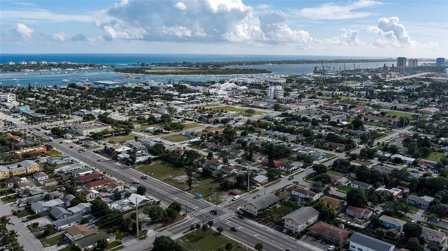 Shovel-ready multifamily site in Riviera Beach! Final site plan approval (Dec 2024) secured for 4 duplex buildings with 8 total units (7,848 SF). Mix includes two-story 3BR/2BA units and single-level 2BR/2BA flats, each with dedicated parking (16 spaces incl. 1 handicap). Lot size ±15,756 SF, zoned Downtown General (DG), with current design covering 26% of the lot (max 70%) and FAR of 0.50 (max 2.0), leaving room for future density or alternate layouts. Surveys, stamped drawings, and approval letters in hand make this a plug-and-play opportunity for developers. Located on W Blue Heron Blvd, a major corridor linking I-95, US-1, and Singer Island, the property offers strong exposure and access. Rental demand, proximity to employers, beaches, and redevelopment zones enhance long-term value.