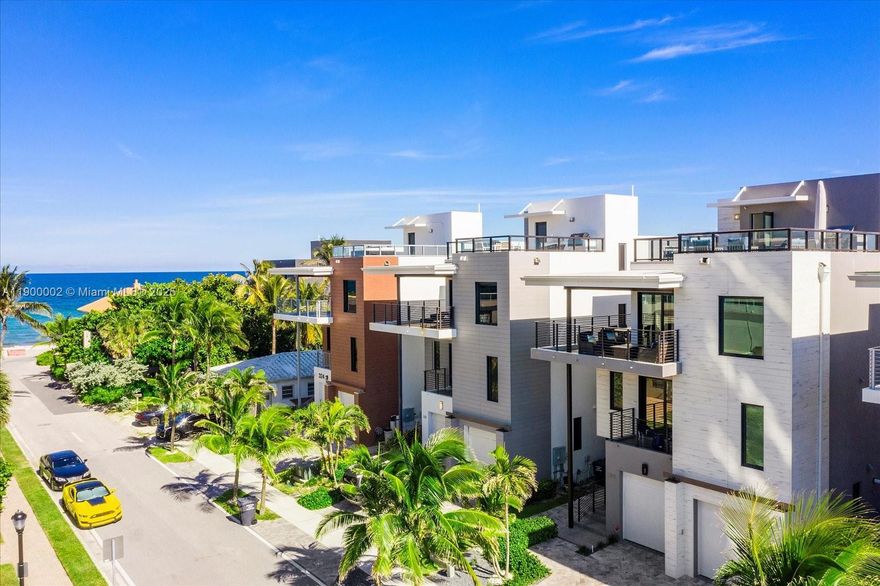 Rare opportunity to rent one of only 8 oceanside homes on Balboa Street in Hollywood, FL - annually or seasonally. This stunning fully furnished 4BR/3.5BA contemporary beach house offers a spacious floor plan with floor-to-ceiling windows opening to the ocean, 360° sunrise-to-sunset views from a private rooftop with summer kitchen, several outdoor terraces, elevator access to all levels, secluded backyard with an outdoor shower, 2-car garage with a driveway for 2 more vehicles. Inside, you will find a South-facing primary suite with spa bathroom, large walk-in closets, & private balcony. Perfectly positioned on the beach of the Atlantic Ocean, minutes from Port Everglades, this home offers the ultimate coastal lifestyle.