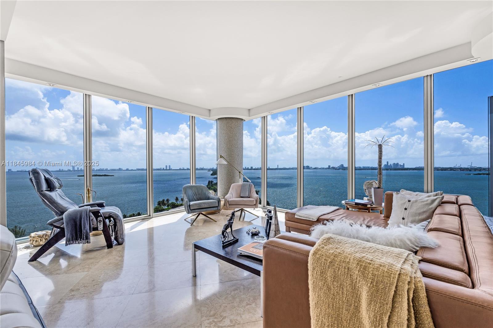 Iconic, wide-open bay views from Blue’s premier corner line define this rare 2BR/2.5BA residence. Spanning 1,870 SqFt, this elegant renovated home features floor-to-ceiling windows, a gourmet kitchen, architectural recessed lighting, motorized shades, built-in closets, and a refined primary suite. 2 new AC units. Includes 3 parking spaces (2 tandem assigned + 1 valet) and 2 storage units. Enjoy peace of mind with fully funded reserves, lobby renovation, and no assessments. Amenities include a semi-private elevator foyer, 2 pools, a state-of-the-art fitness center with sauna and steam rooms, media lounge, BBQ area, party room, dog park, and more. Walk to Midtown & Design District, minutes to Miami Beach, Brickell, and Miami International Airport.