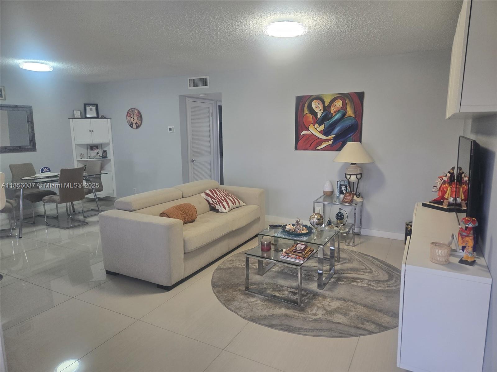 Beautiful and secure 55+ community! This stunning 2-bed, 2-bath apartment boasts exquisite tile floors, creating a luxurious ambiance. Ideally situated minutes from Hollywood Boardwalk, Beach, 1-95, Hard Rock Casino/Hotel, and more, it offers a perfect blend of urban vibrancy and Sunshine State beauty. Fantastic amenities like a gated entrance, security, pool, fitness room, clubhouse, BBQ area, shuffleboard, common laundry, extra storage, guest parking, and a courtesy bus. Monthly HO fees cover landscaping, water/sewer, garbage, building insurance, and exterior maintenance.