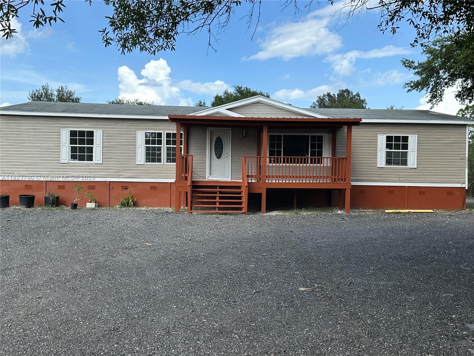 Discover this beautifully property 3-bedroom, with 3 walking closet, and 2-bath in Montura Ranch, FL, offering 2,108 sq ft of spacious living. Set on 1.25 acres of cleared land, this property provides privacy, space, and endless possibilities, ideal for gardening, outdoor activities, or future additions. The home features a new central AC, with recently remodelated updated kitchen, bathrooms, flooring, and fresh paint. In the backyard has a independent room, bathroom and other additional amenities, perfect for guests. Enjoy peaceful country living with all the comforts of a move-in ready home. Located in a growing area with no HOA, this property is perfect for families, investors, or anyone seeking a blend of space and style. Don’t miss out on this opportunity!