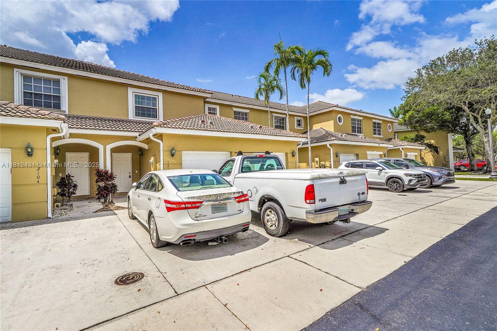 Investor special! This 2-bedroom, 2.5-bathroom two-story townhouse with garage is full of potential and can be rented out immediately—association approval takes less than a week. The home features an attached garage, a screened-in patio, tile flooring on the first floor, an updated kitchen, and a convenient half bath downstairs. Upstairs, both bedrooms have their own private en-suite bathrooms. Major updates include a newer A/C unit and hot water tank. While the property needs some TLC, Basic cable and internet are included in the HOA, making it even more appealing for investors or buyers looking to add personal touches. Don't miss this opportunity to unlock value in a highly desirable area!