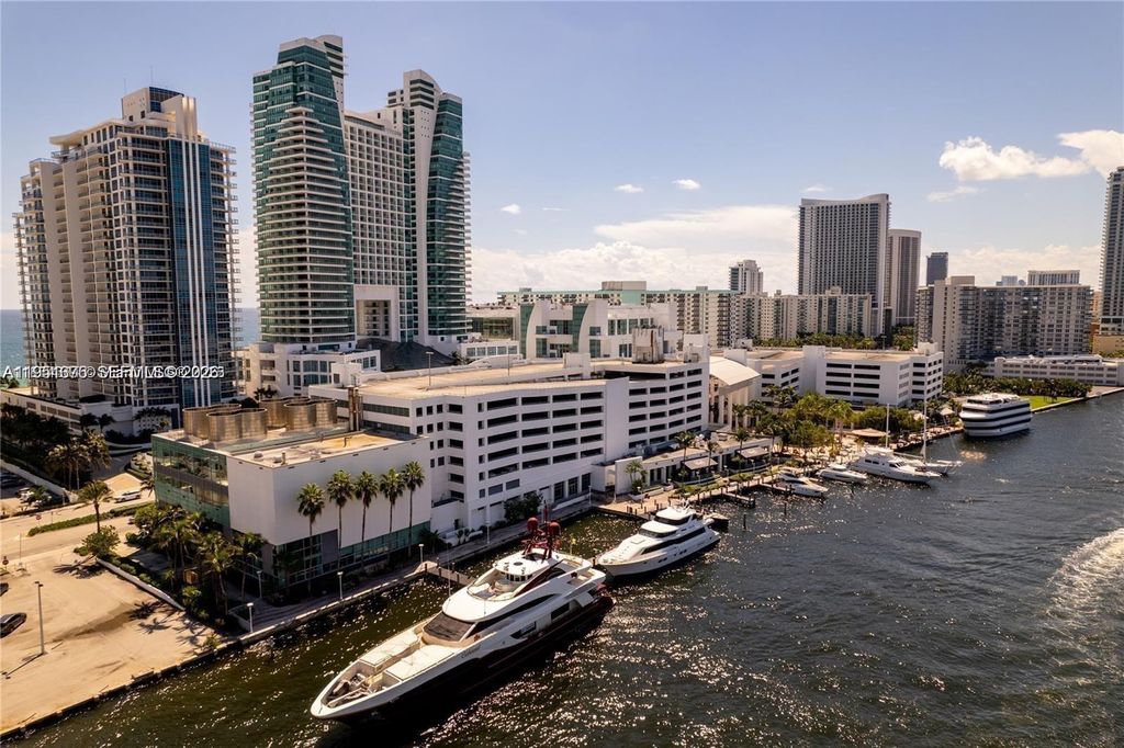 Photo of 400 Leslie Dr #207, Hallandale Beach, FL 33009 (MLS # A11951376)