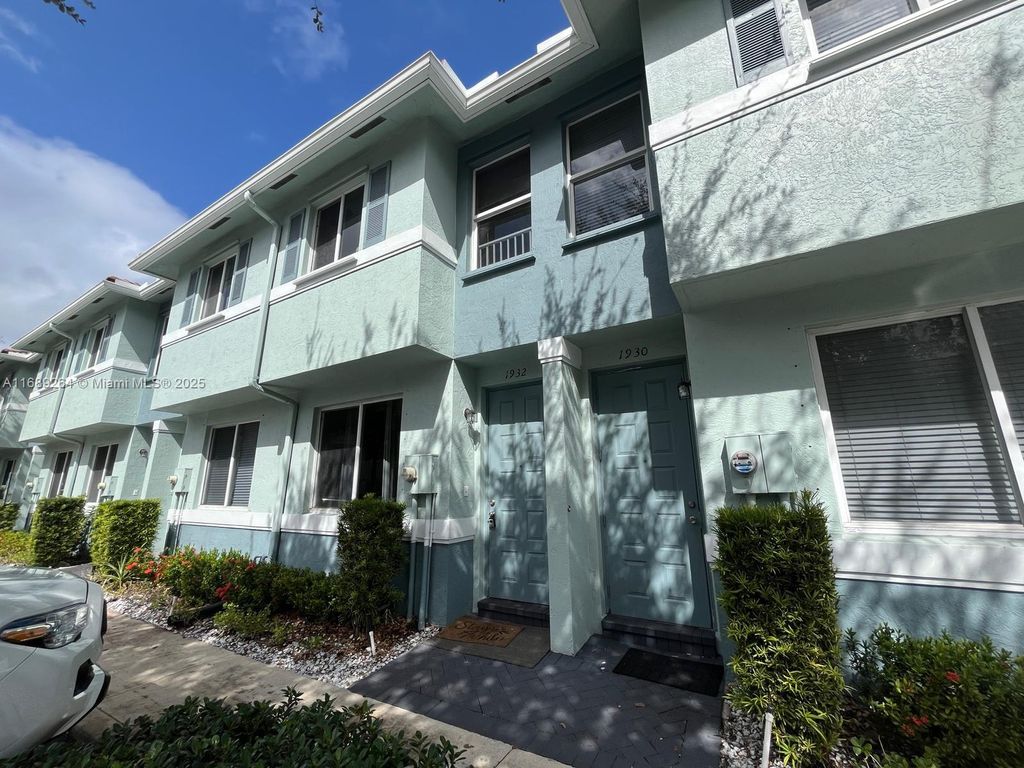 Photo of 1932 Alamanda Way, Riviera Beach, FL 33404 (MLS # A11689264)