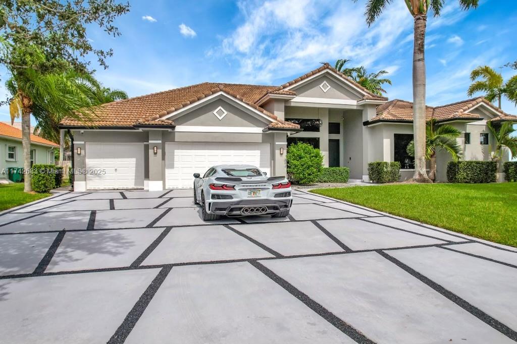 Beautiful corner lot home with golf course view in the sought-after Fairways at Keys Gate neighborhood. Recently renovated one-story 4 bedrooms home with an office, multipurpose room, 3 1/2 baths and 3 car garage. Gorgeous pool area. Remodeled kitchen, floors and bathrooms. The large master bedroom features Motorized Blackout curtains, a sitting area/nursery area, his and her closets, a newly renovated bathroom with dual sinks, a beautiful modern tub, and a step-in shower with his and hers shower heads. Open floor plan: Kitchen opens into the family room. The home includes modern black impact windows with an spectacular pool view from every main room. Association includes: cable, high-speed Internet, roving security guard, and alarm system.