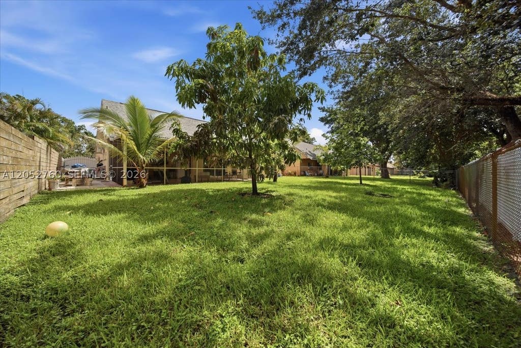 Photo of 9050 Crescent Dr, Miramar, FL 33025 (MLS # A12052760)