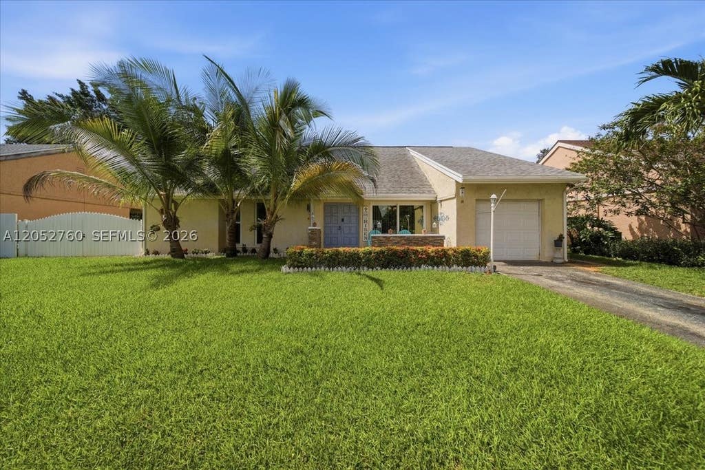 Photo of 9050 Crescent Dr, Miramar, FL 33025 (MLS # A12052760)