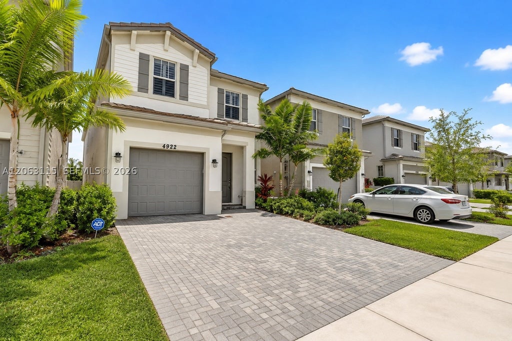 Photo of 4922 NW 48th Ter #4922, Tamarac, FL 33319 (MLS # A12063115)