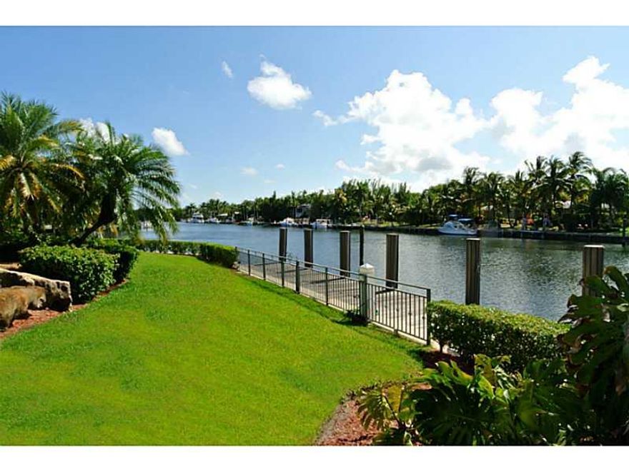 Understated elegance defines this custom waterfront estate on 32,246 sf lot, among the largest in gated Old CutlerBay.300+ ft seawall/no bridges to Bay.European garden entrance ct.Formal & informal living & entertaining areas open to terrace spanning the  back of home,w/an expansive view of the wide waterway.7 bdrms + a richly outfitted executive office also open to terr.Master ste sitting area,terr & 2 walk ins.Staff qrtrs by kit.All impact,highest end finishes/materials. Sq. Ft. as per Tax/Realist.