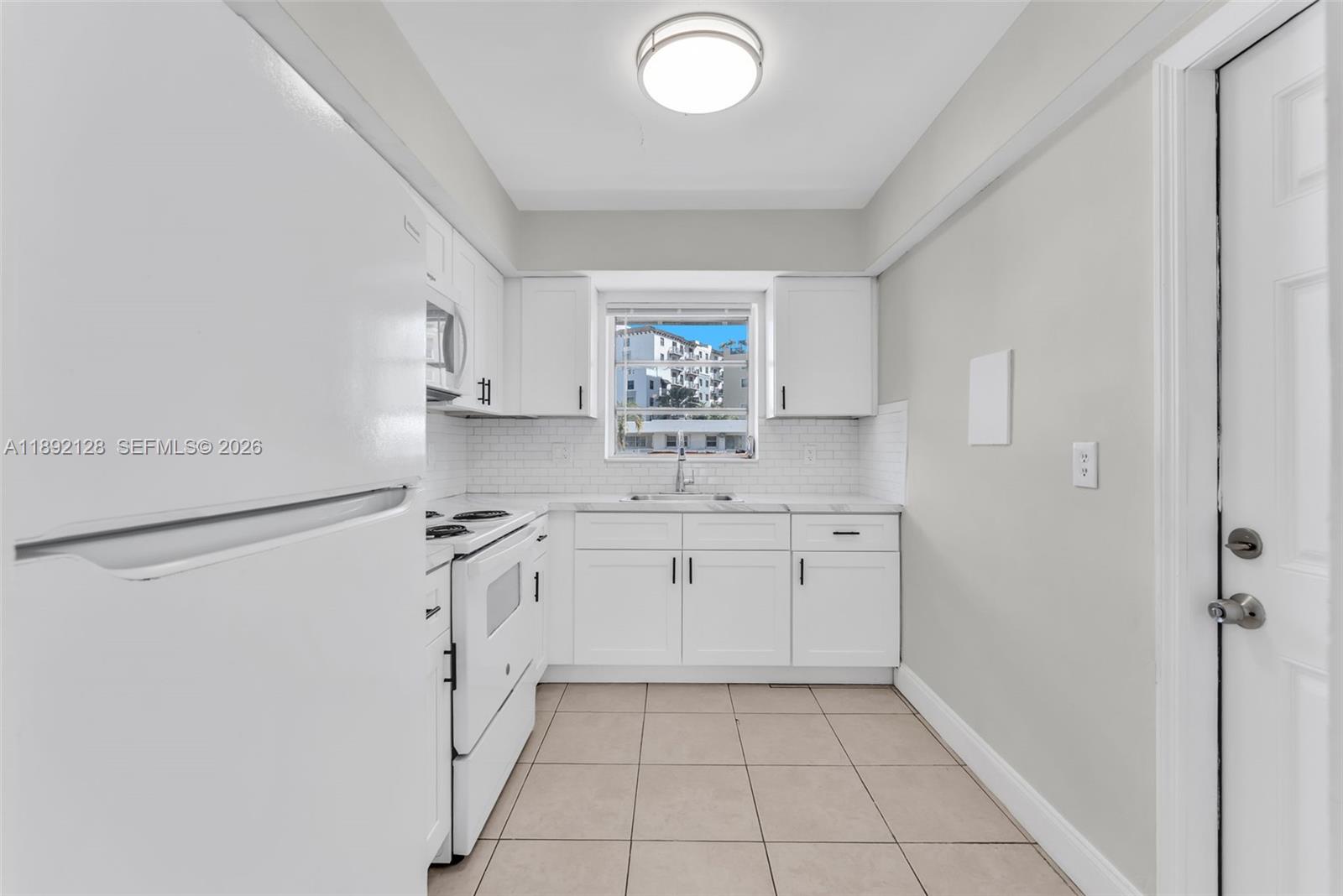 VILLAGE AT DADELAND CONDO - Residential