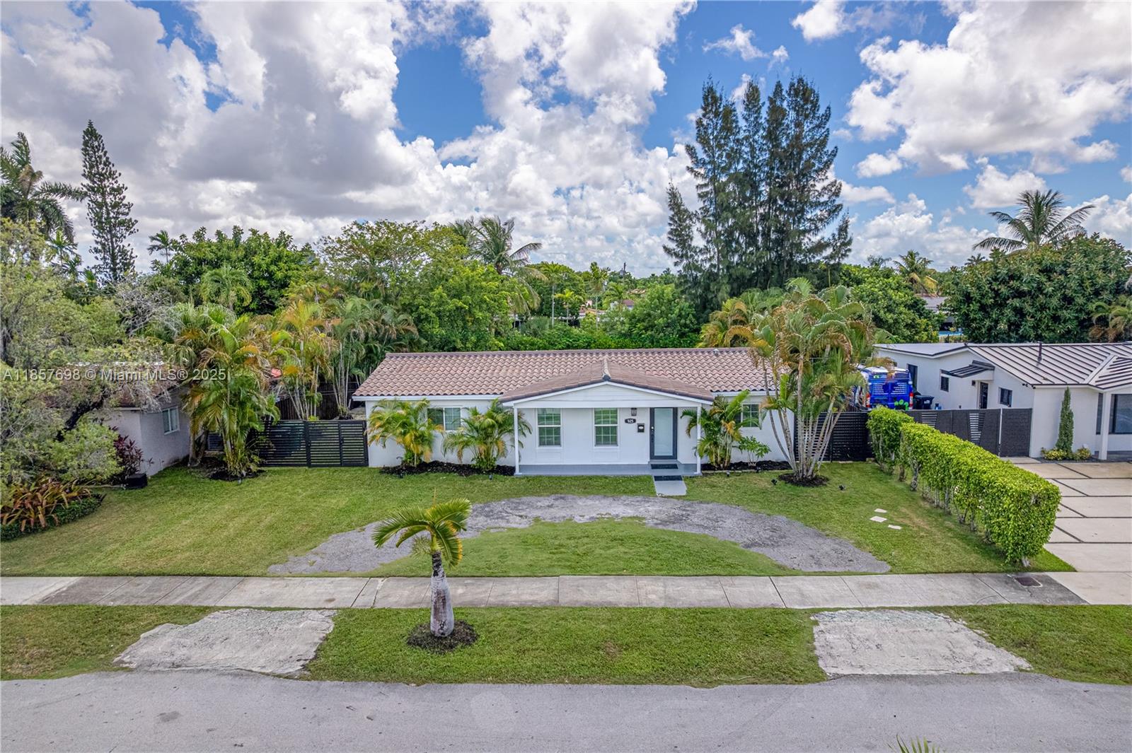 Check out this stunning, fully remodeled home in the desirable Coral Park Estates! This spacious property boasts a split floor plan with 5 bedrooms and 3 bathrooms, offering an ideal layout for both comfort and privacy. Highlights include 2 master bedrooms, a modernized kitchen, updated bathrooms, brand-new flooring, impact windows, and a roof that's just 3 years old. With over $140,000 in recent upgrades, including a new plumbing system, this home is a must-see. The home has 2,050 Square feet of living area, NO HOA, Financing available!