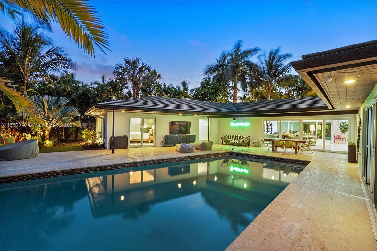 2516 Bayview Drive is a highly unique mid-century modern house situated amongst extraordinary tropical landscaping with the highest levels of intracoastal privacy. Constructed in 1956 and renovated to create best-in-class execution of classic mid-century style with today’s top amenities. 4 bedrooms provide abundant individual space with 3 including high-end en suites, stunning master / master bathroom, a gourmet kitchen, and more. 12,793 square foot lot with jungle like landscaping provides an ultra-private and a true resort like feel. Impact resistant windows, sewer lined in 2022 with a 40+ year warranty, new generator, new roof coating, new paint inside & out, slat wall, pond expansion, extensive landscaping work, and much more.