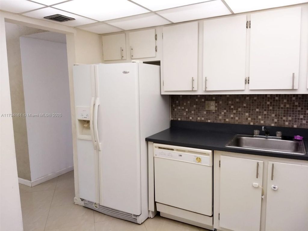 Photo of 4394 NW 9th Ave #22-3C, Deerfield Beach, FL 33064 (MLS # A11794161)