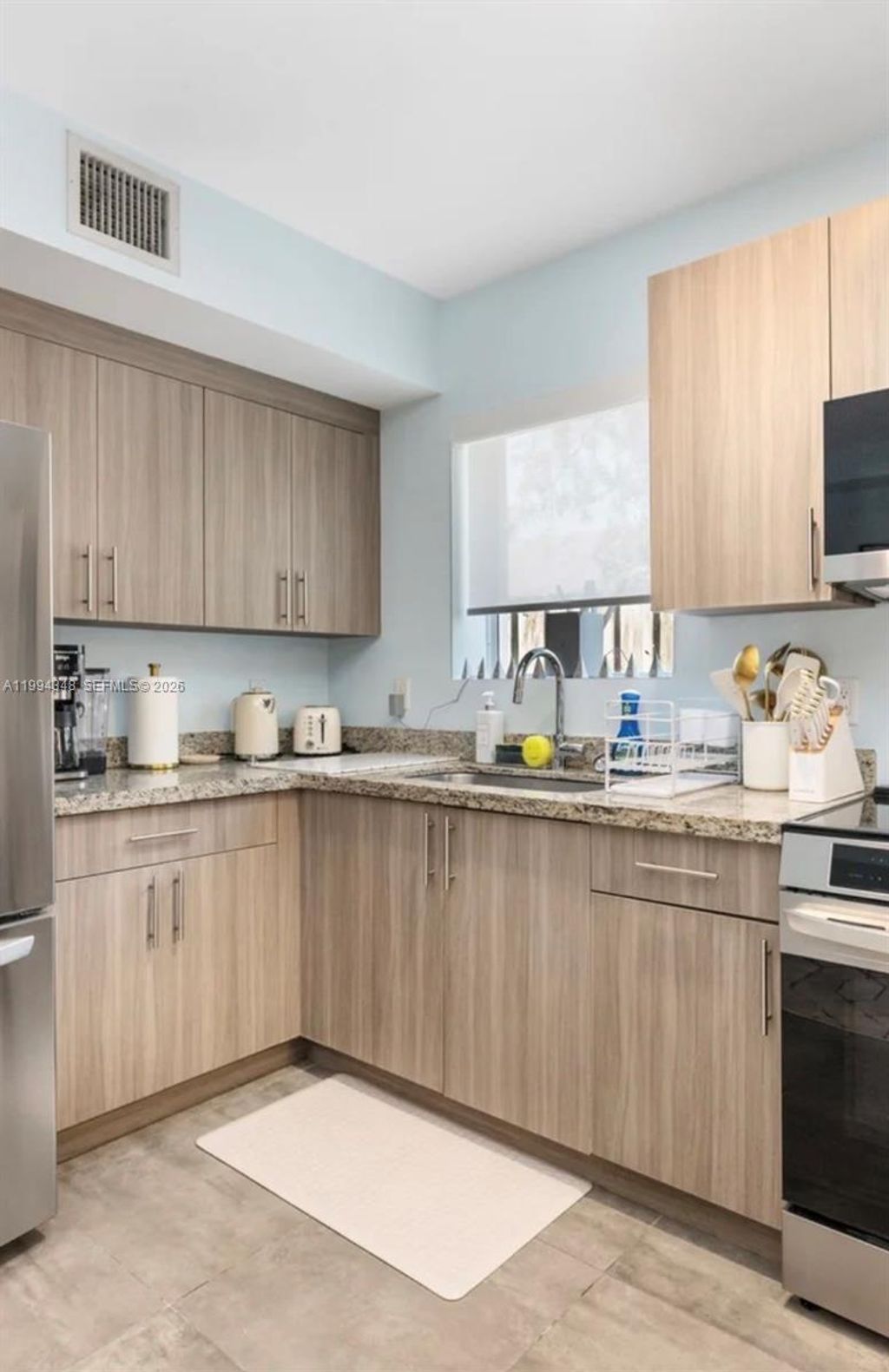 Photo of 165 NW 39th St #7, Miami, FL 33127 (MLS # A11994348)